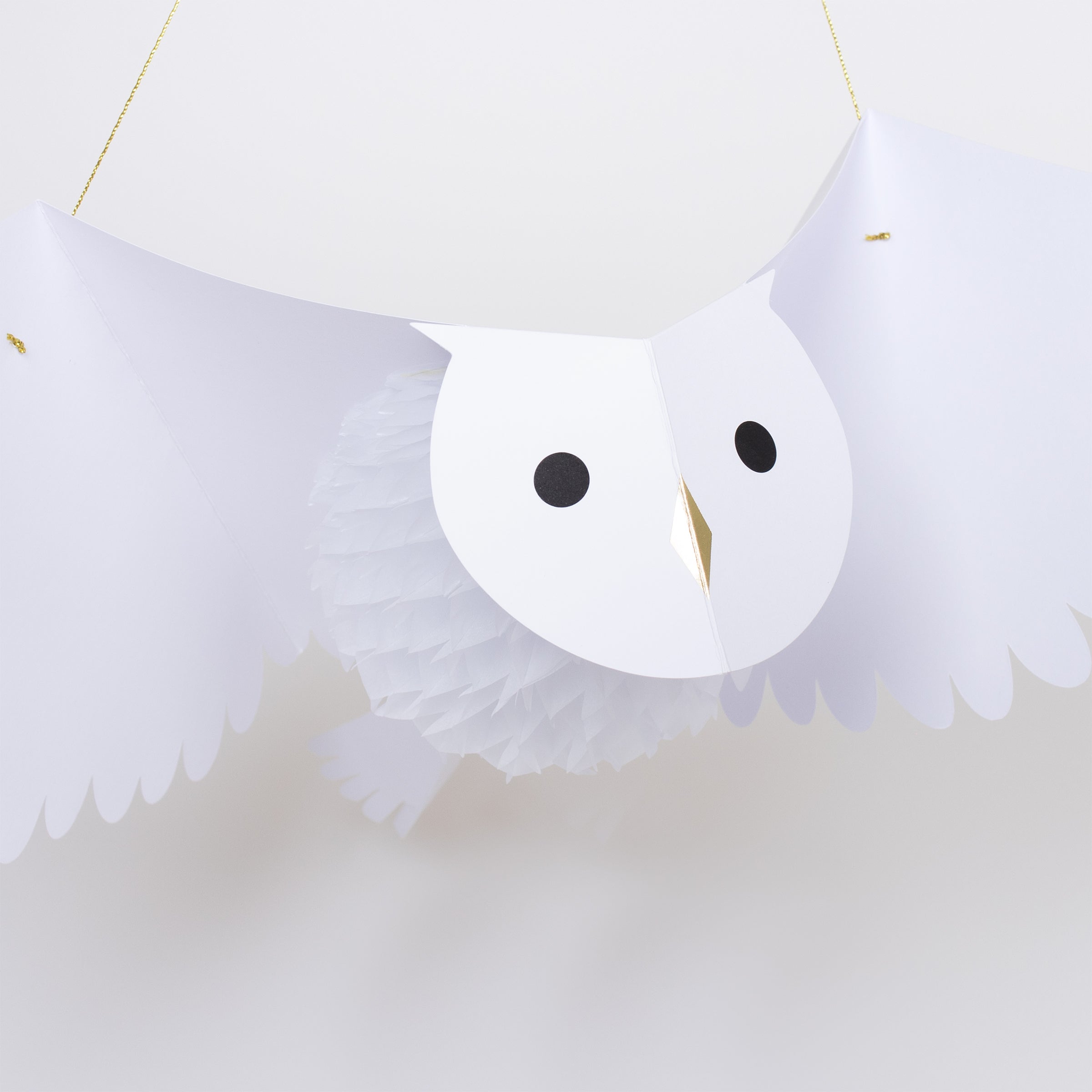Our paper owls make the perfect hanging decorations to add to your Halloween party supplies, or for a wizard birthday party.