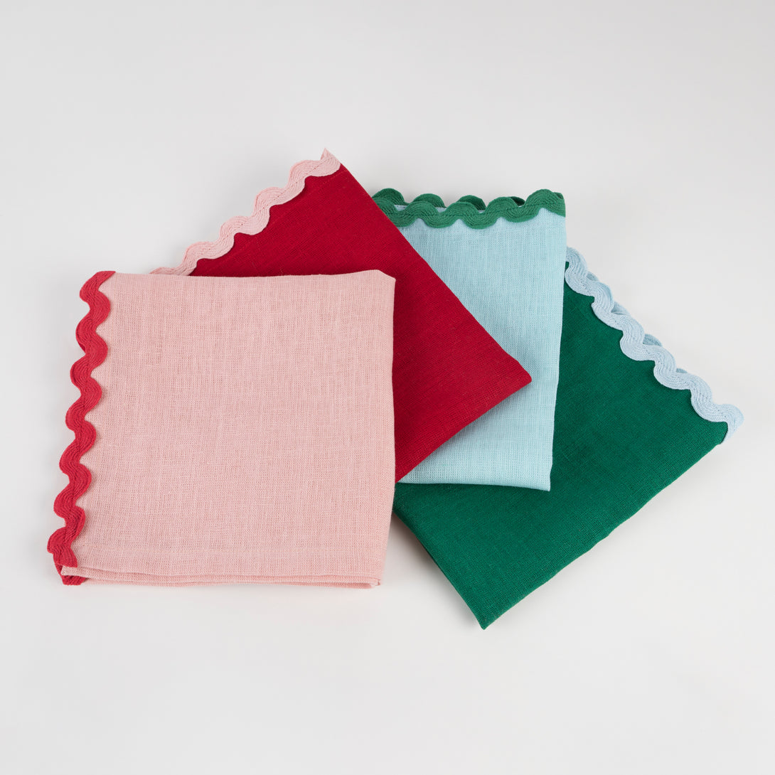 Our green, pink and red fabric napkins, with ric rac details, are perfect for Christmas tableware.