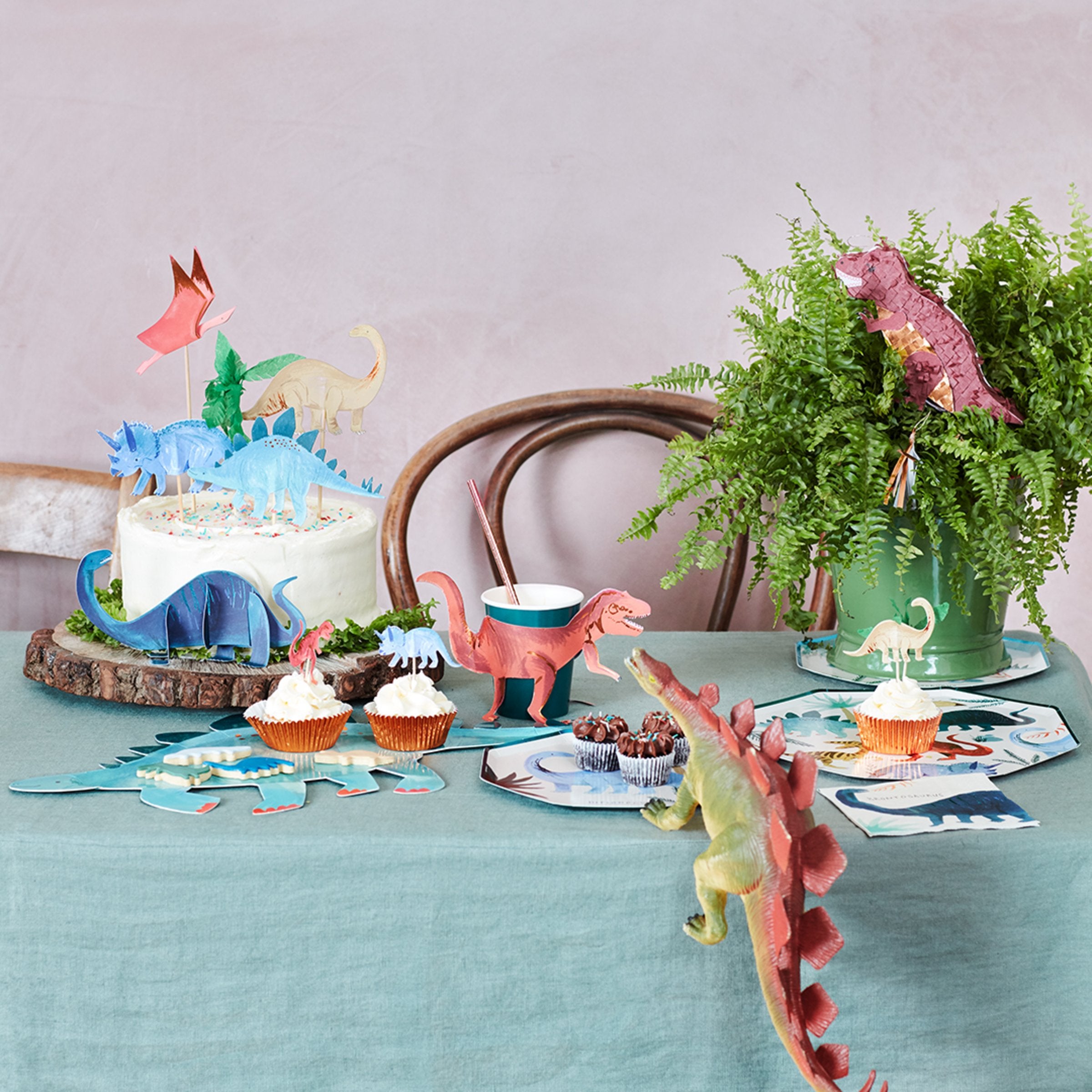Our special dinosaur cake decorations, featuring 5 dinosaur toppers and a palm tree, are wonderful dinosaur party decorations.