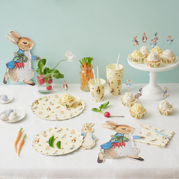 This delightful cupcake kit includes 24 Peter Rabbit characters' toppers with coordinating cupcake cases. Image8