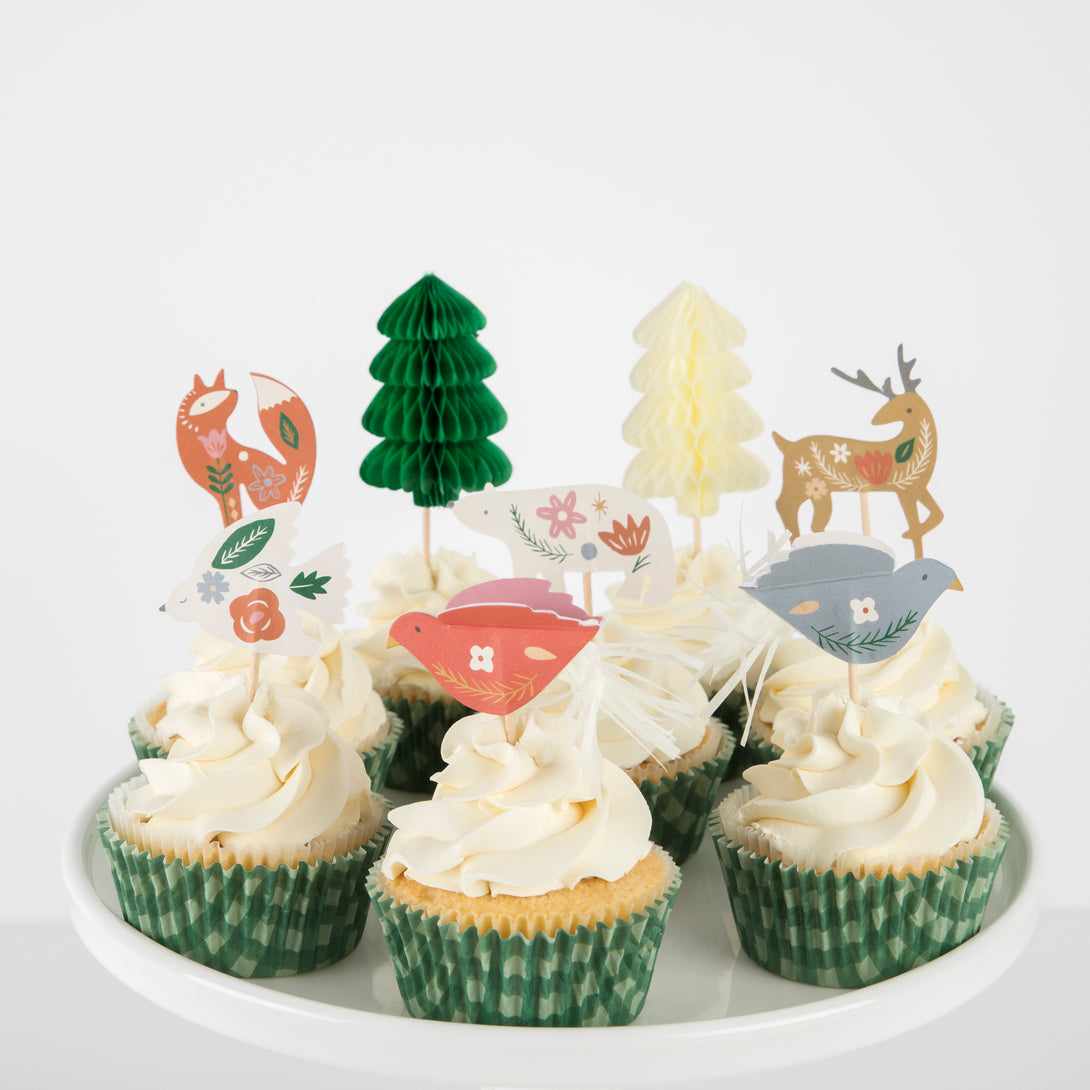 Our kit contains everything you need for cupcake decorations including  cupcake toppers and cupcake cases.