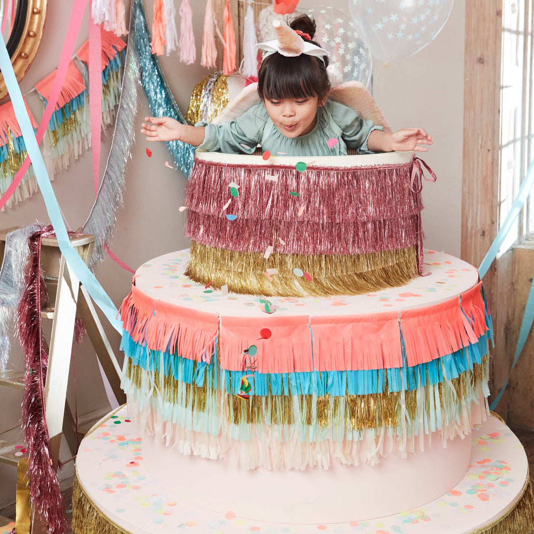 Our paper garland is pre-strung on ivory cord and has colorful paper and foil fringing to make any party room look amazing.