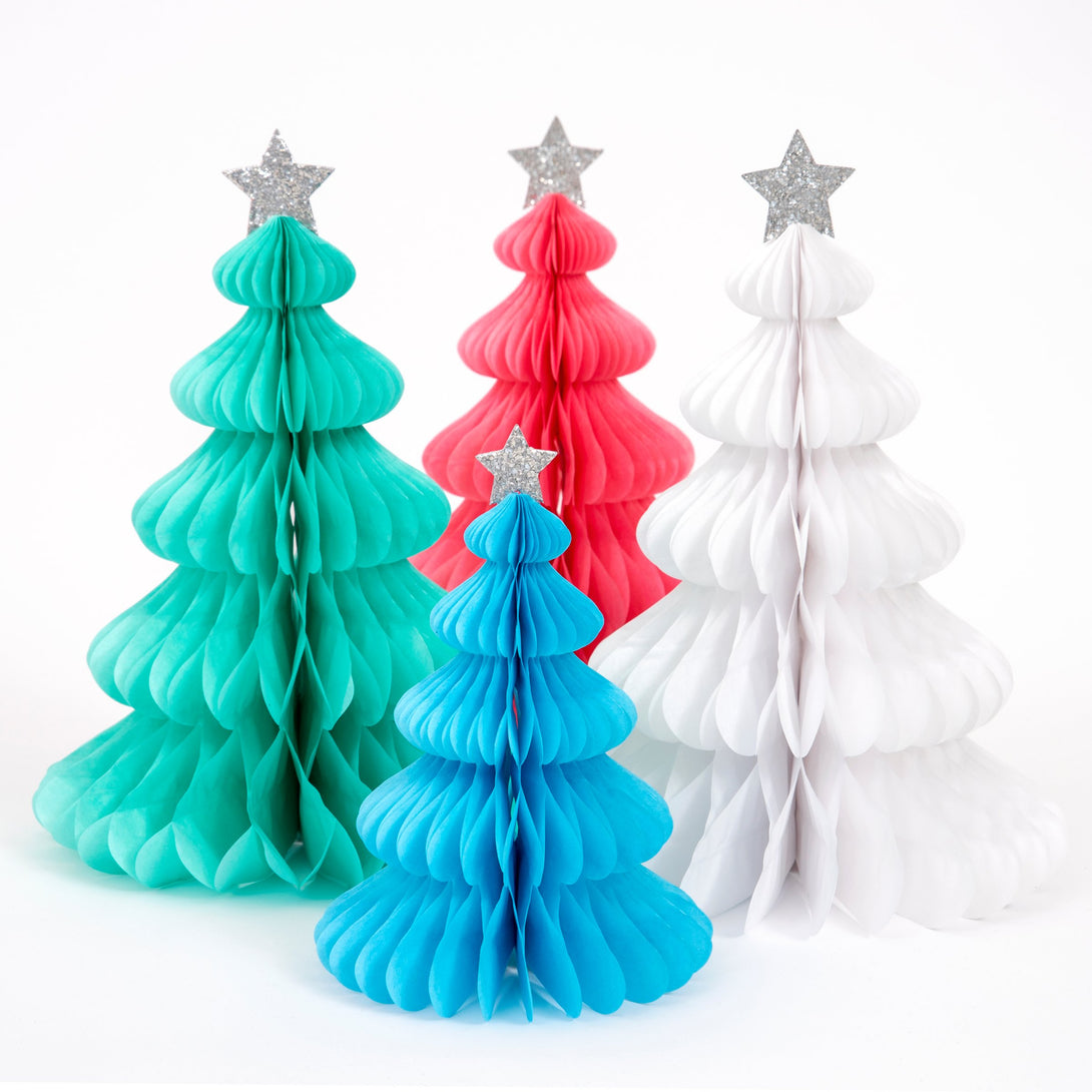 These beautiful honeycomb decorations are made from tissue paper with shining silver stars on top.