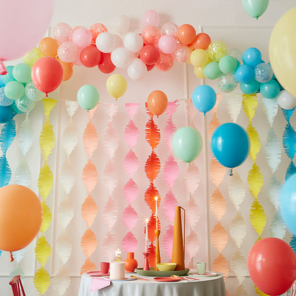 Our party backdrop is crafted from paper streamers in 8 colours. Image2