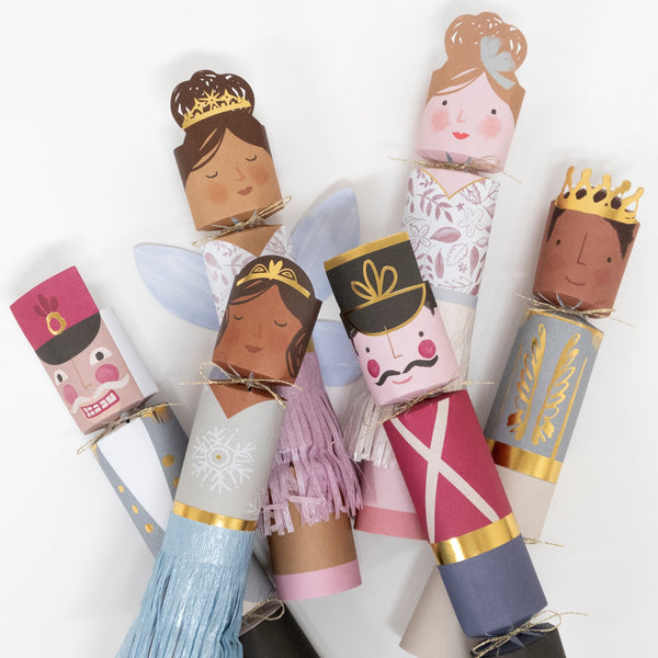 Our Nutcracker Kids Christmas crackers have delightful embellishments, and include a Christmas brooch, party hat and joke. Image3