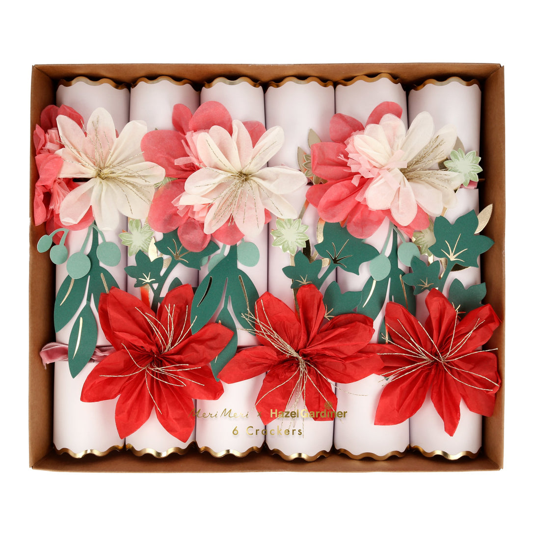 These Christmas crackers have beautiful tissue paper flowers and gold foil leaves.
