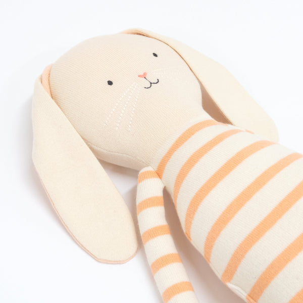 Alfalfa bunny is crafoted from knitted organic cotton, with floppy ears, a pompom tail and sweet stitched features. Image3