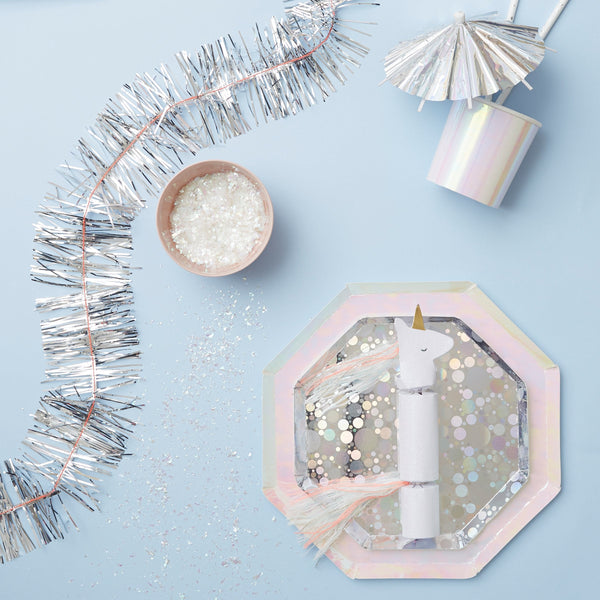 These unicorn party crackers have crystal glitter and gold foil detail, with a yarn tassel mane and tail. Image5