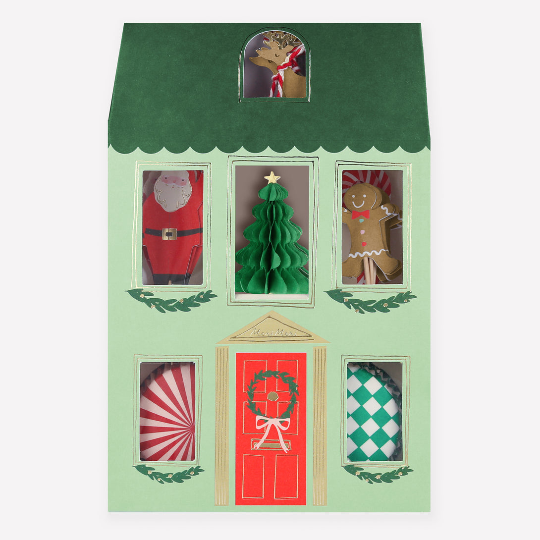 Make Christmas cupcakes with our Christmas cake toppers and cupcake cases, in a kit designed to look like a merry festive house.