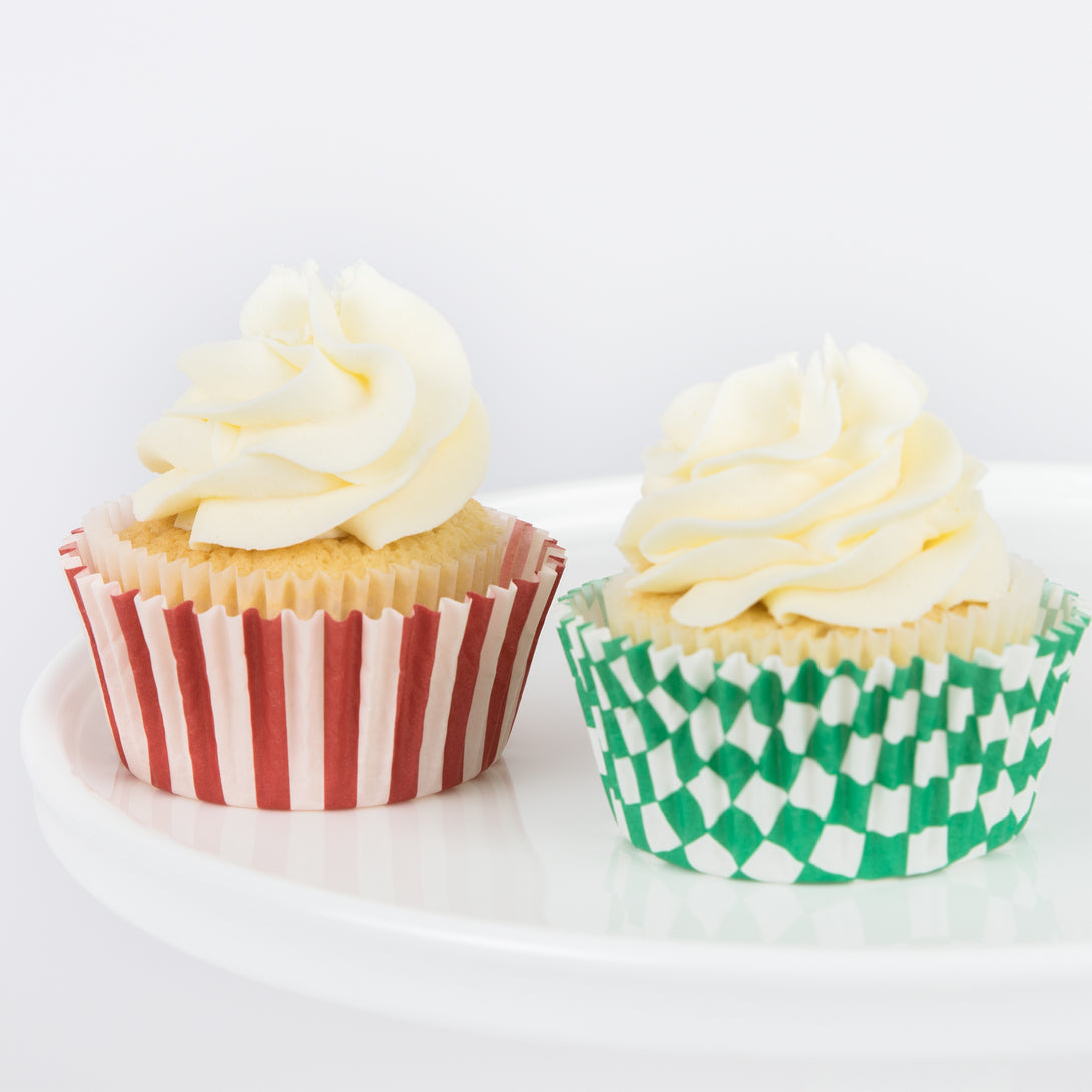 Make Christmas cupcakes with our Christmas cake toppers and cupcake cases, in a kit designed to look like a merry festive house.