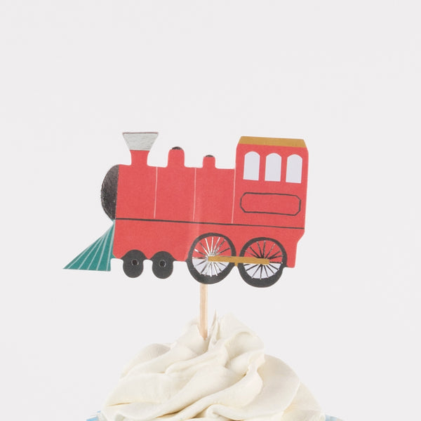 Our special cupcake kit feature train cake toppers and striped blue and teal cupcake cases. Image6