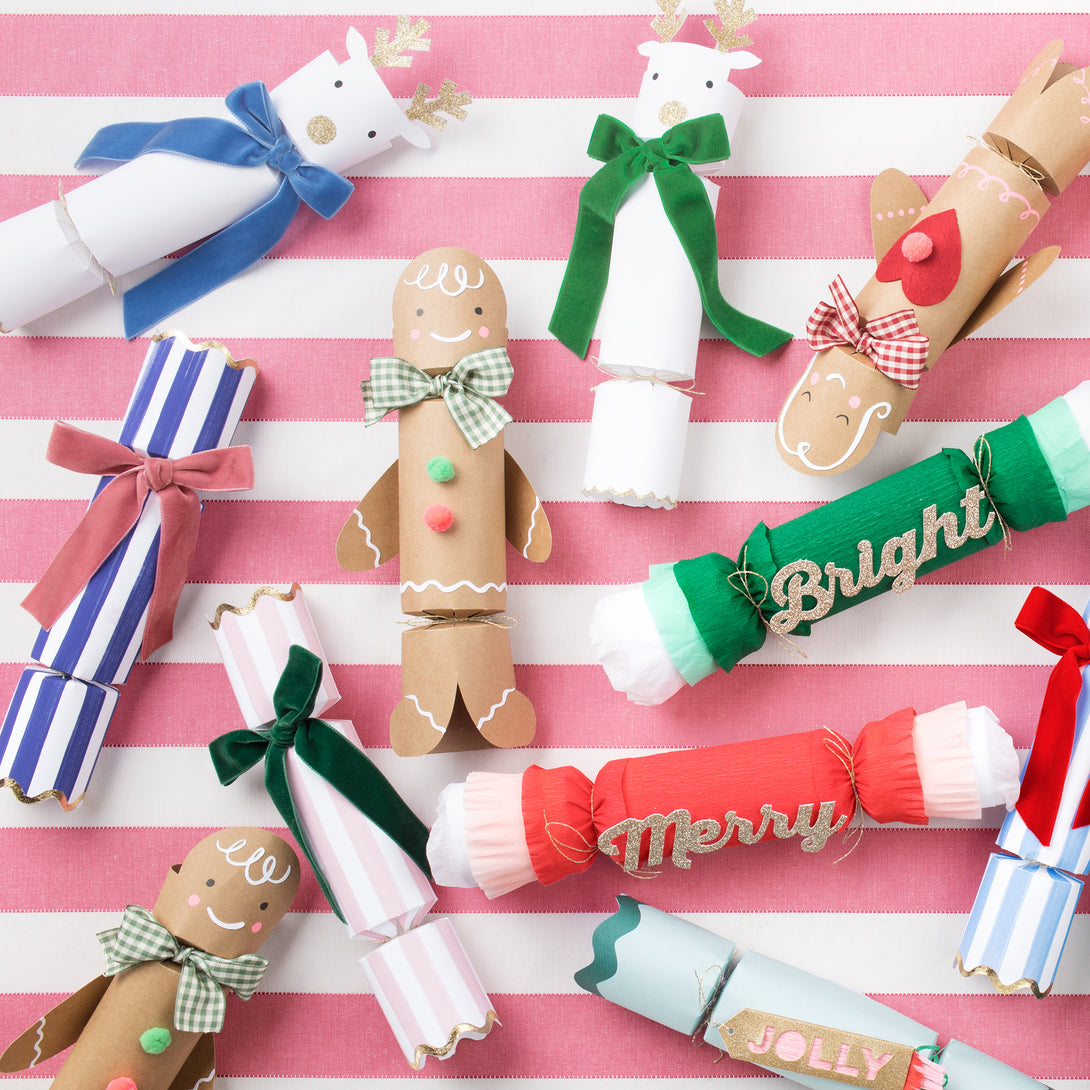 Our luxury crackers, with stripes and bows, contain fun erasers, paper party hats and more.