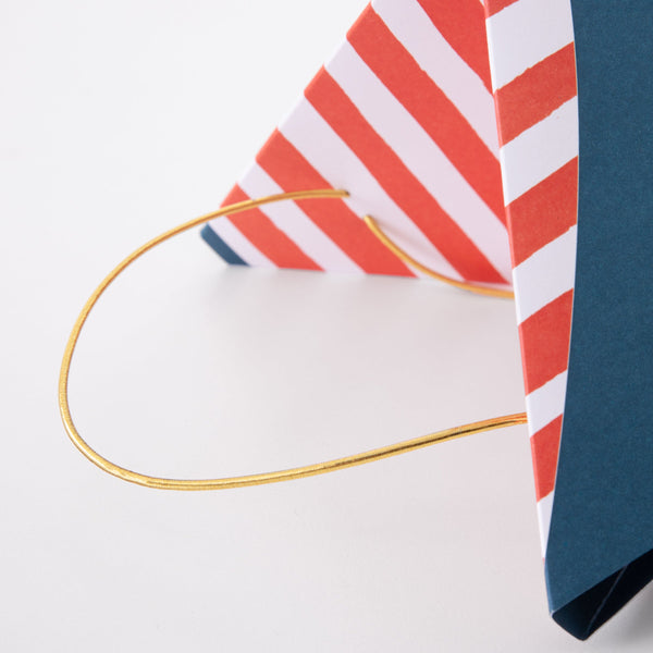 Our pirate hats, with skulls and crossbones and swords, are really special party hats for a pirate party. Image4