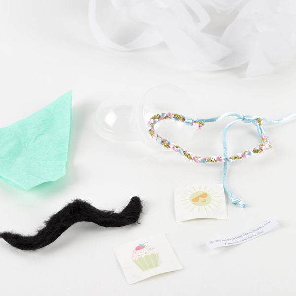 This party favours are cleverly crafted to look like cupcakes, and contain temporary tattoos for kids and friendship bracelets. Image3