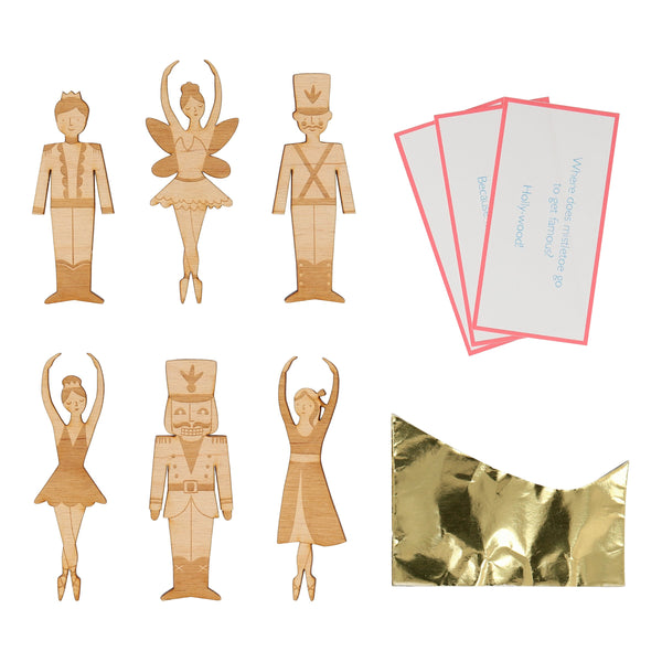 Our Nutcracker Kids Christmas crackers have delightful embellishments, and include a Christmas brooch, party hat and joke. Image2