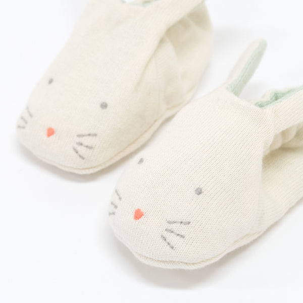 These adorable bunny booties are crafted from knitted organic cotton, with a mint lining, stitched features and floppy ears. Image3