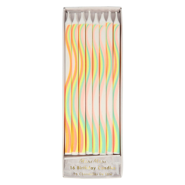 These candles, with a swirling rainbow pattern, are perfect for a rainbow party theme or a baby shower.
