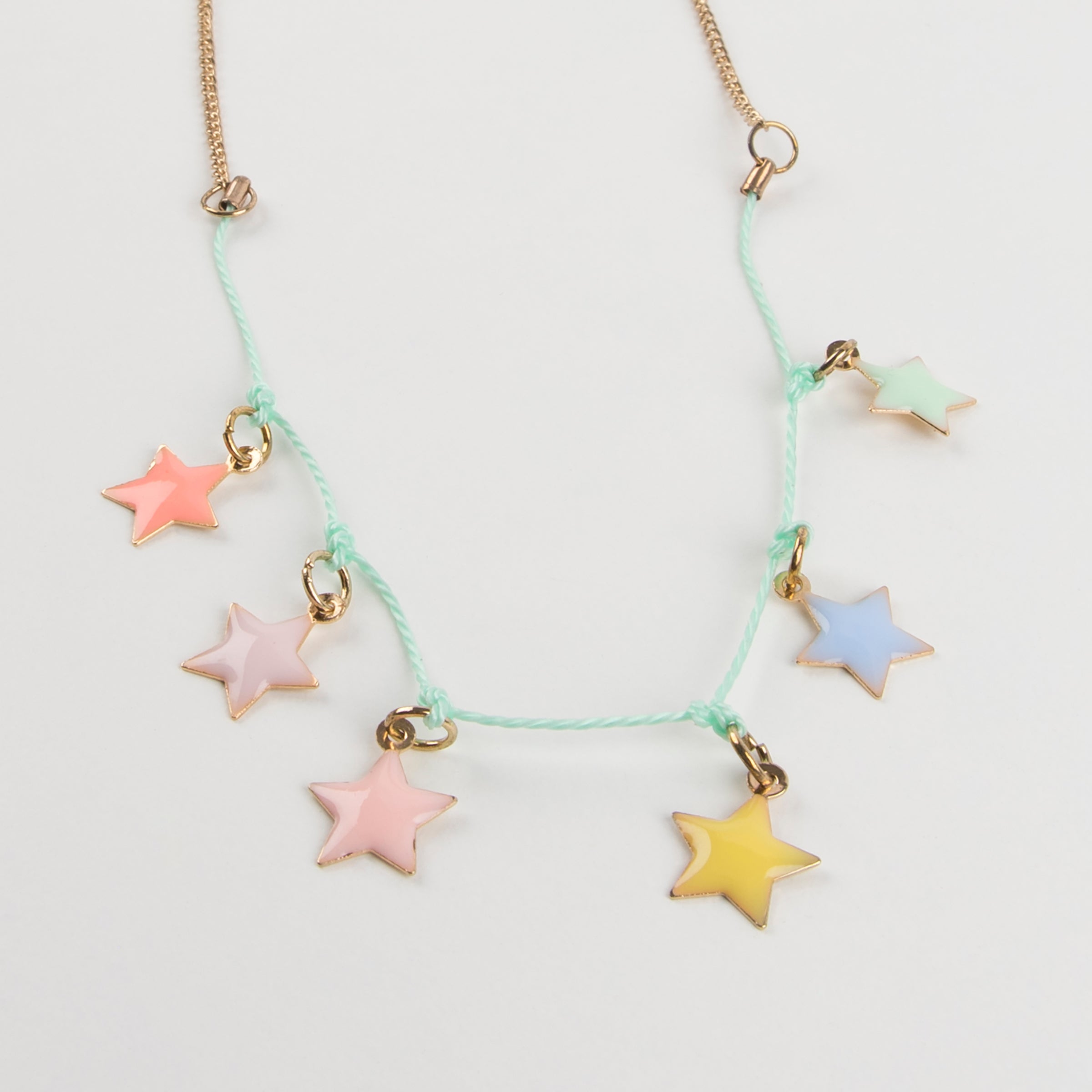 Our fabulous Christmas necklace, with enamel stars, is a wonderful Christmas accessory.