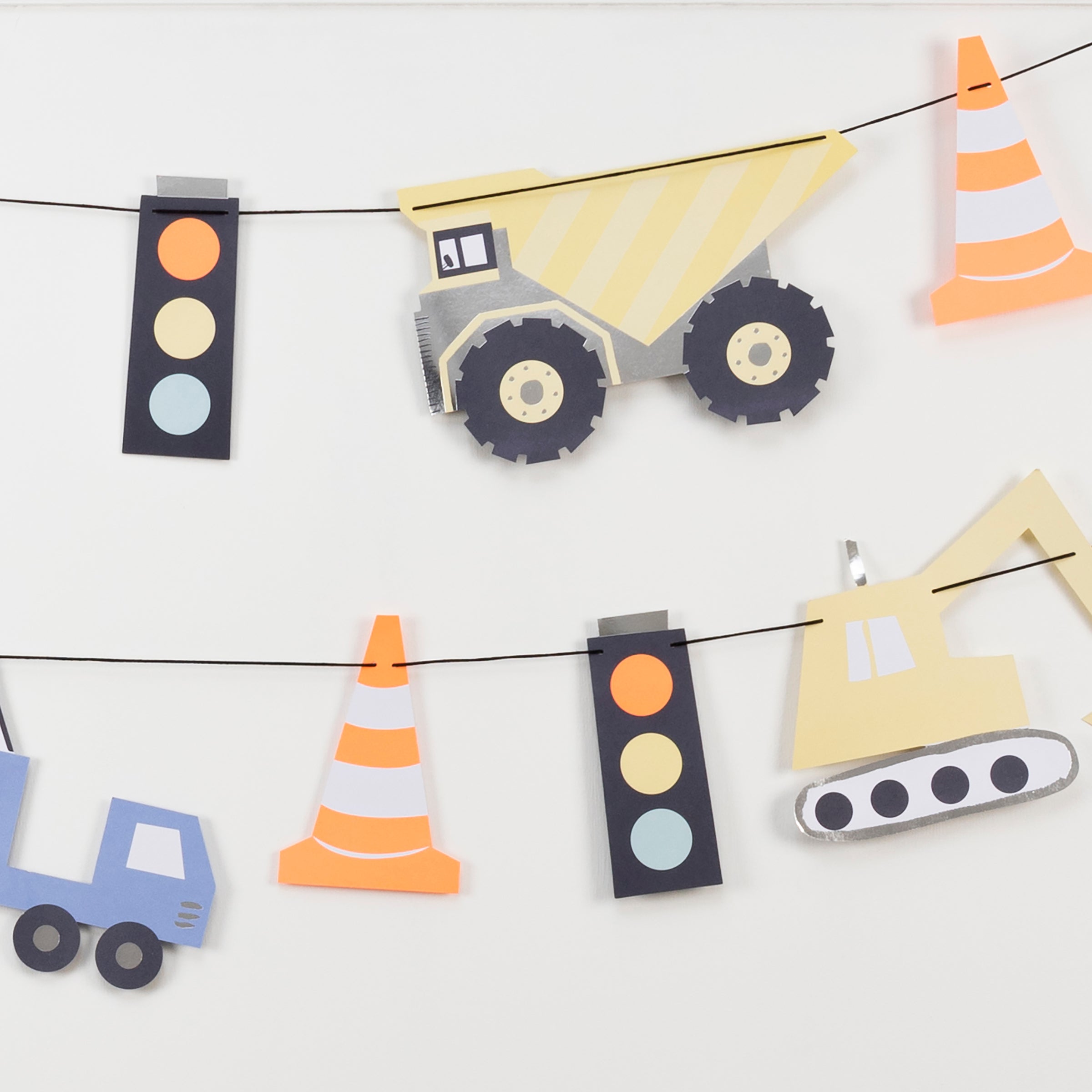 Our colourful paper garland is perfect for a construction party.