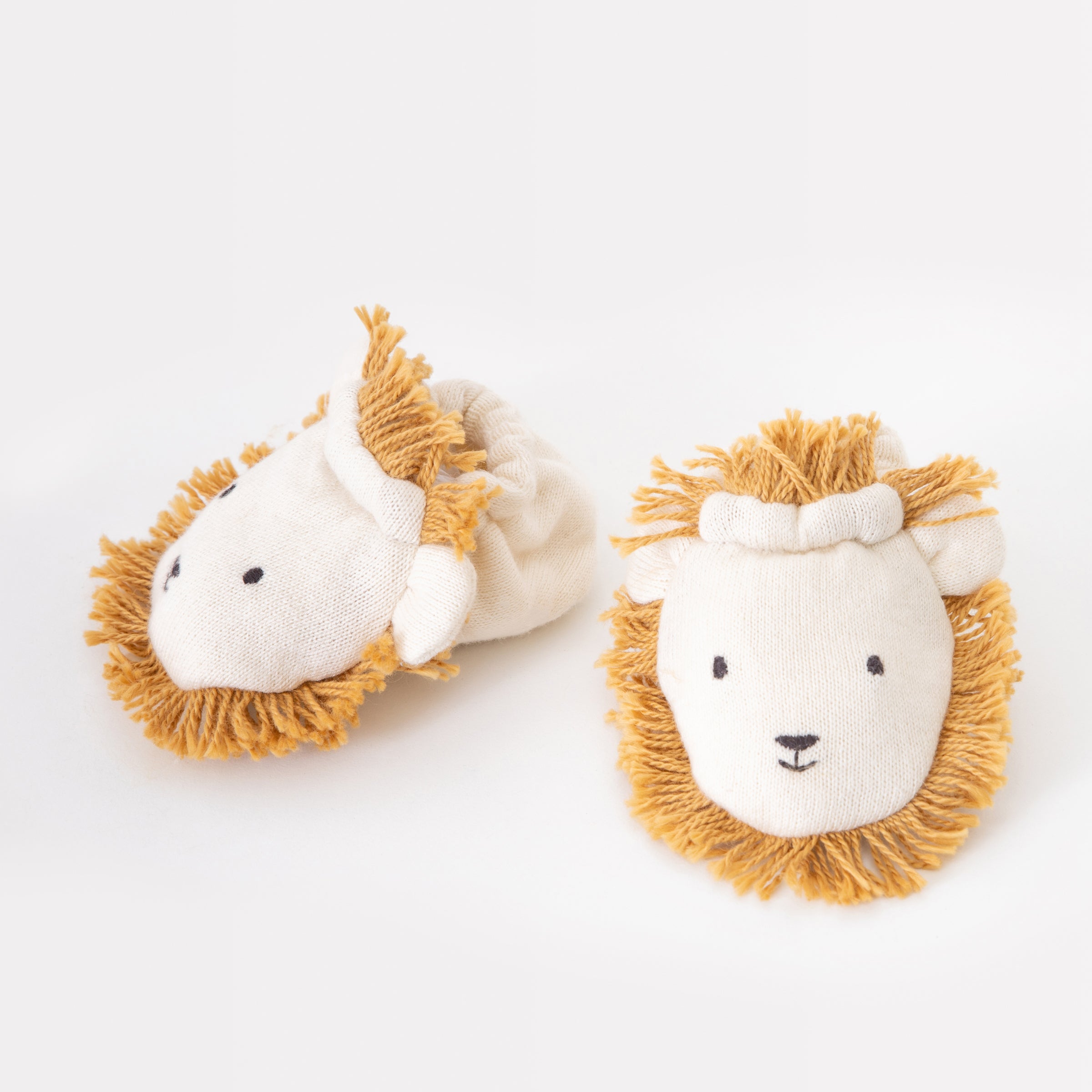 If you're looking for baby shower gift ideas then our lion baby booties, crafted from organic cotton, are perfect.