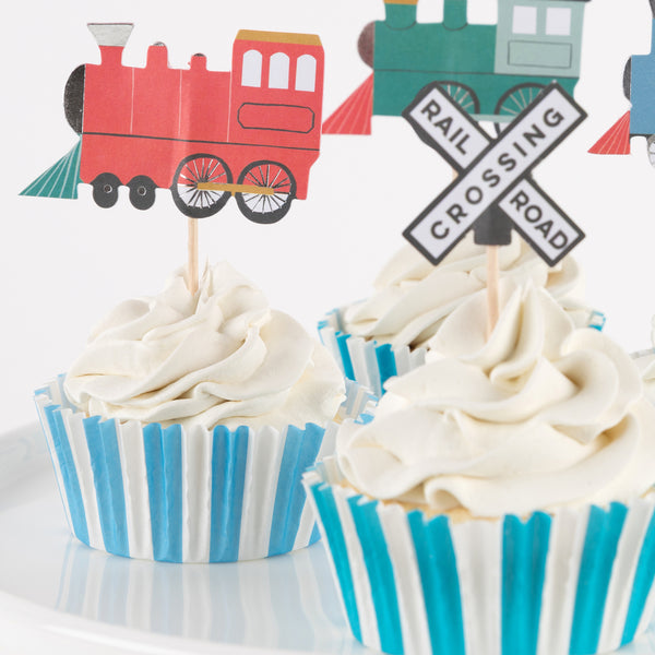 Our special cupcake kit feature train cake toppers and striped blue and teal cupcake cases. Image8