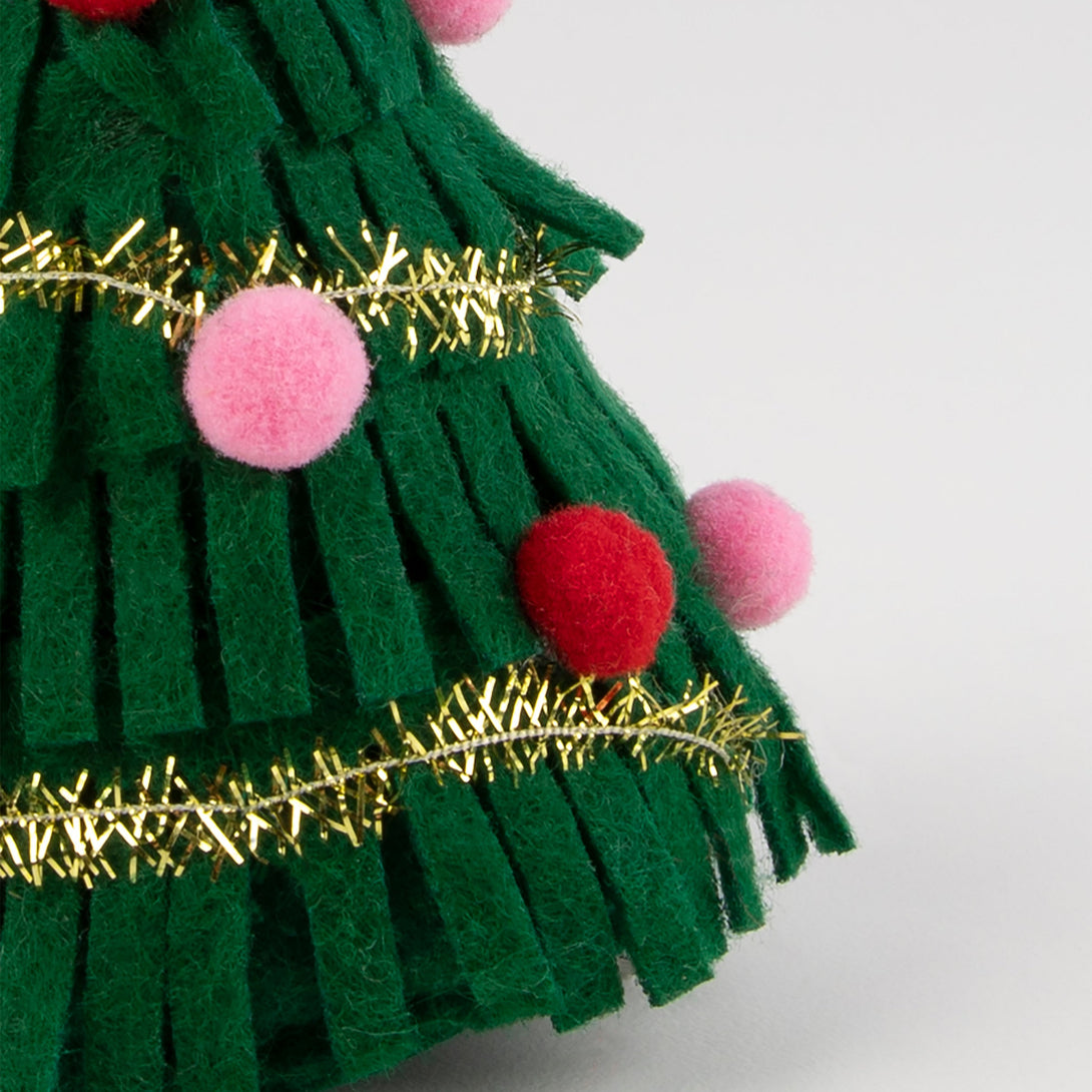 Our Christmas hair accessory is crafted from felt to look like a sparkling Christmas tree.