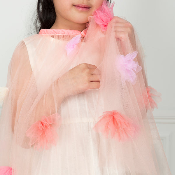 Our kids cape is crafted from tulle with tulle flower embellishments. Image2