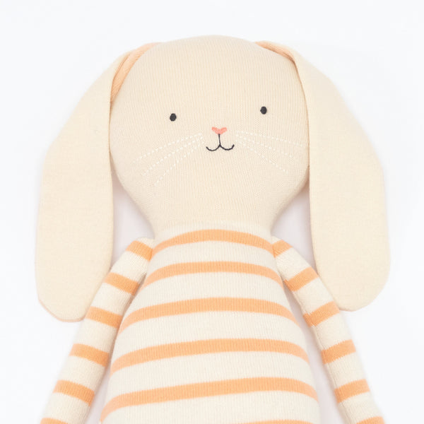 Alfalfa bunny is crafoted from knitted organic cotton, with floppy ears, a pompom tail and sweet stitched features. Image2