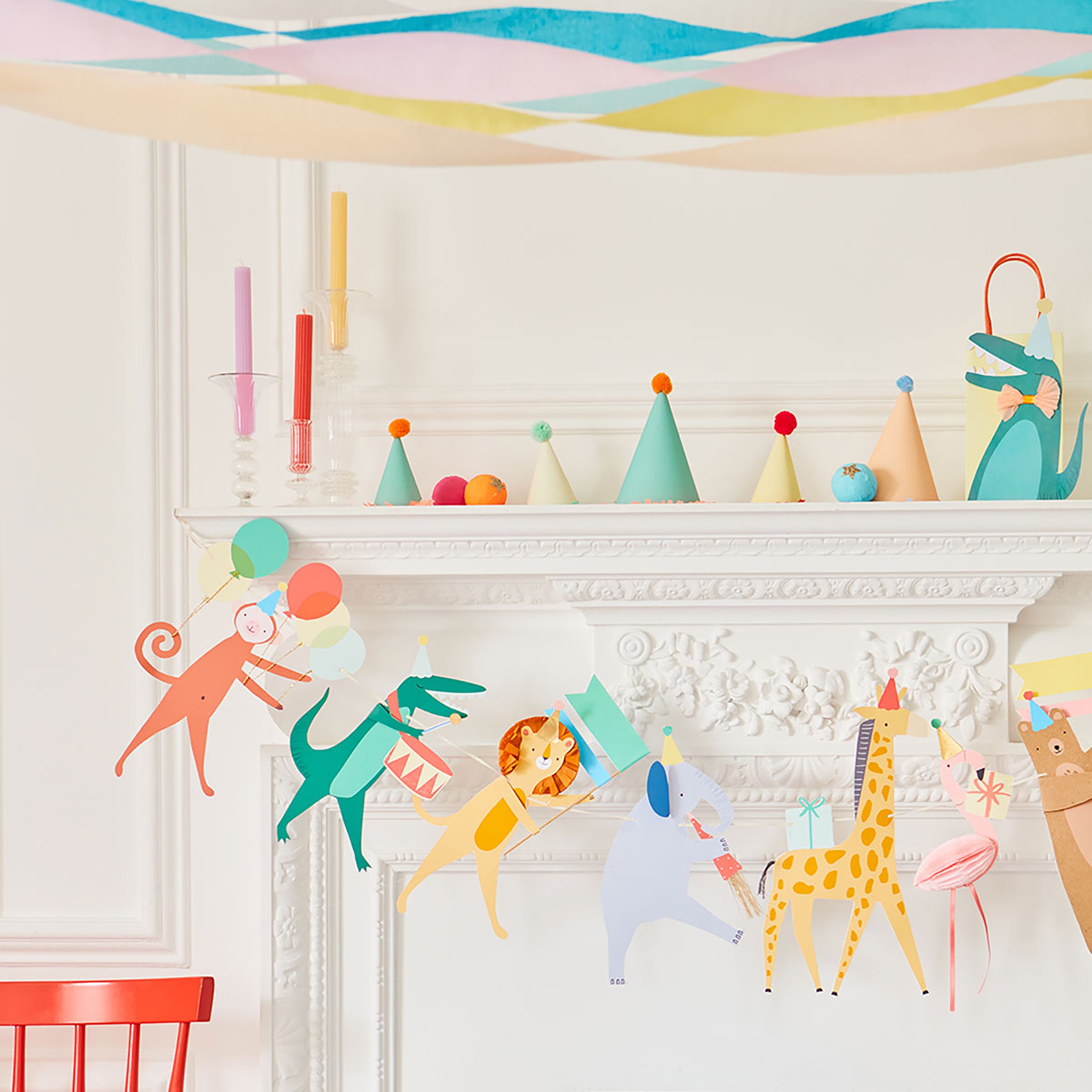 Our paper garland features animals with fun embellishments.
