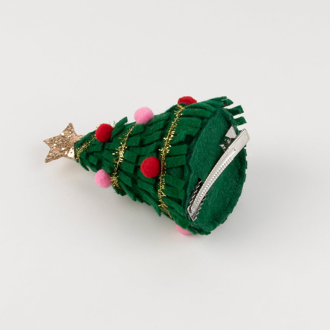 Our Christmas hair accessory is crafted from felt to look like a sparkling Christmas tree.