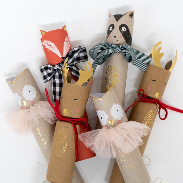 Our woodland animal crackers, with wooden animal gifts, a joke, and a party hat inside ,are really special. Image4