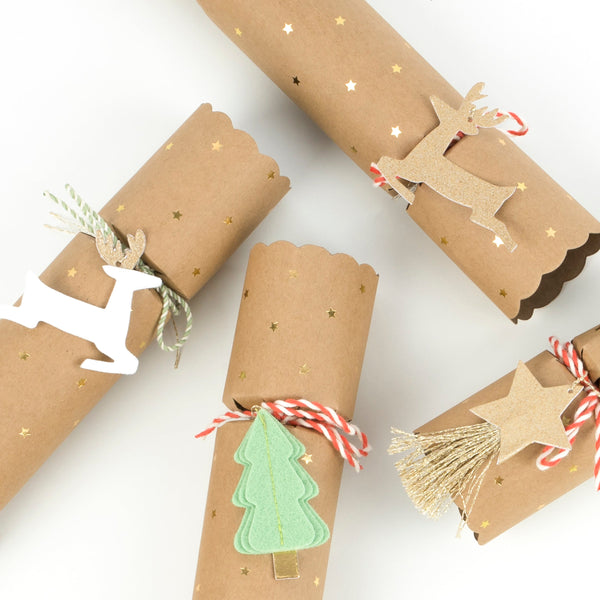 Our gold Christmas crackers include Christmas brooches. Image3