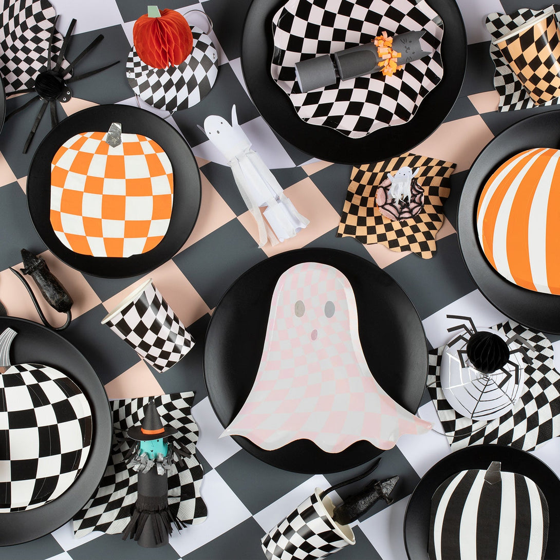 Our party napkins have a swirling black checkered pattern perfect go add to your Halloween party ideas.